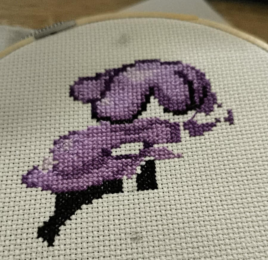 Hand-stitched Muk cross-stitch in progress